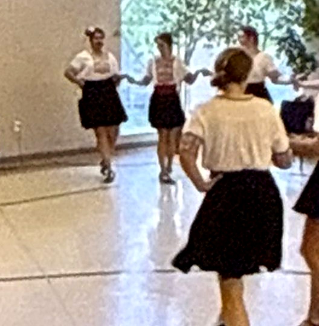 Zdravets dancers rehearsing a horo in a hall